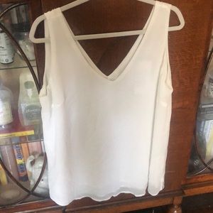White sleeveless blouse